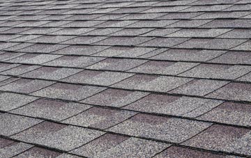 Racedown tiles for shallow pitch roofing